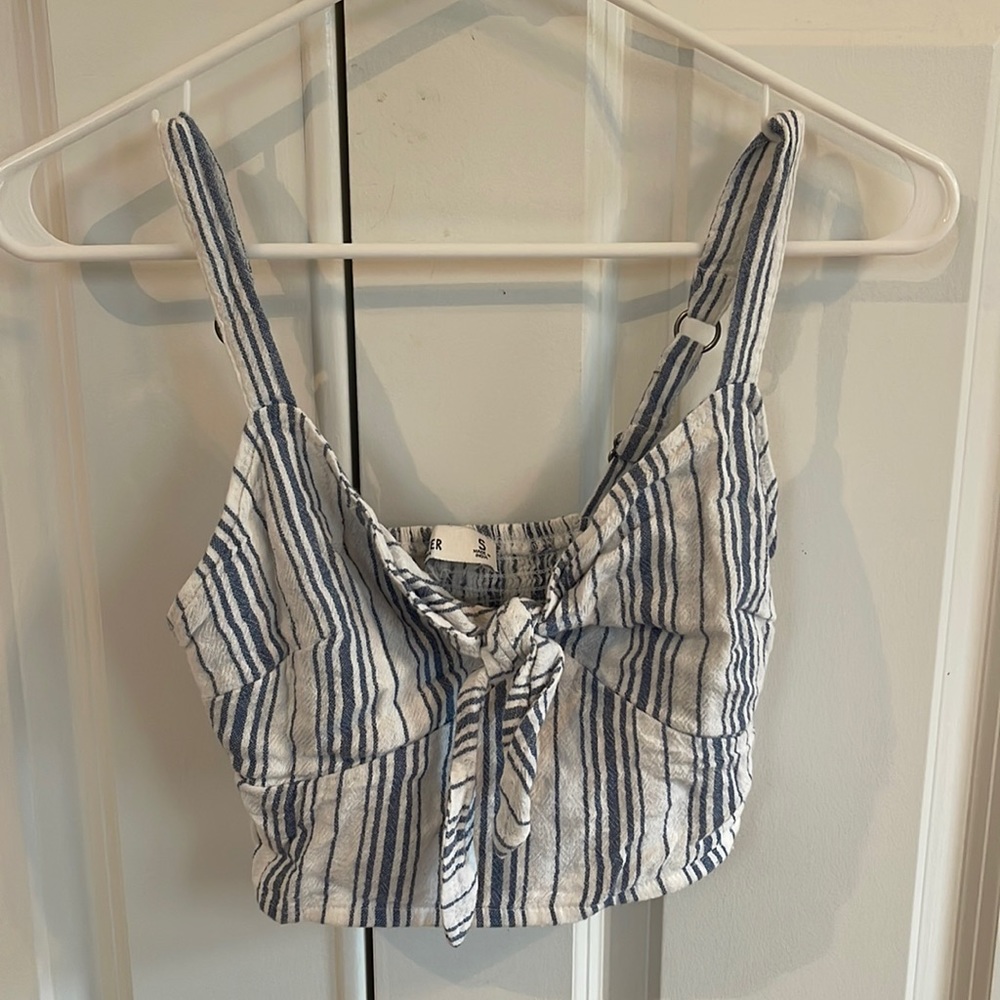 white tank top with light blue strips